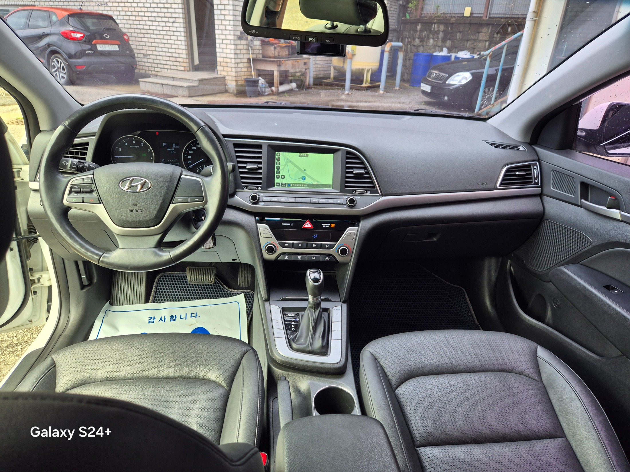 Used Korean vehicle on a dealer lot in South Korea