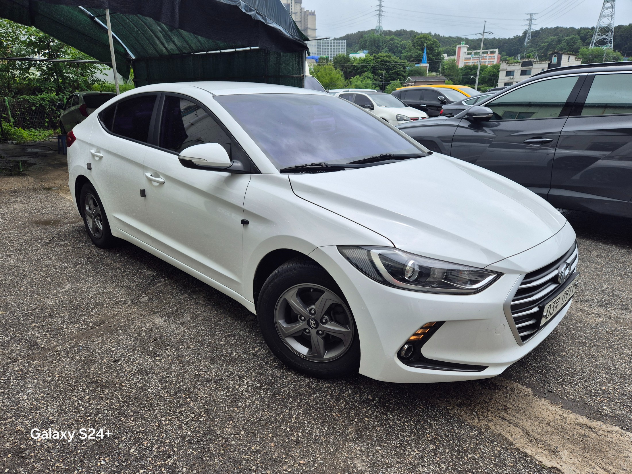 Used Korean vehicle on a dealer lot in South Korea