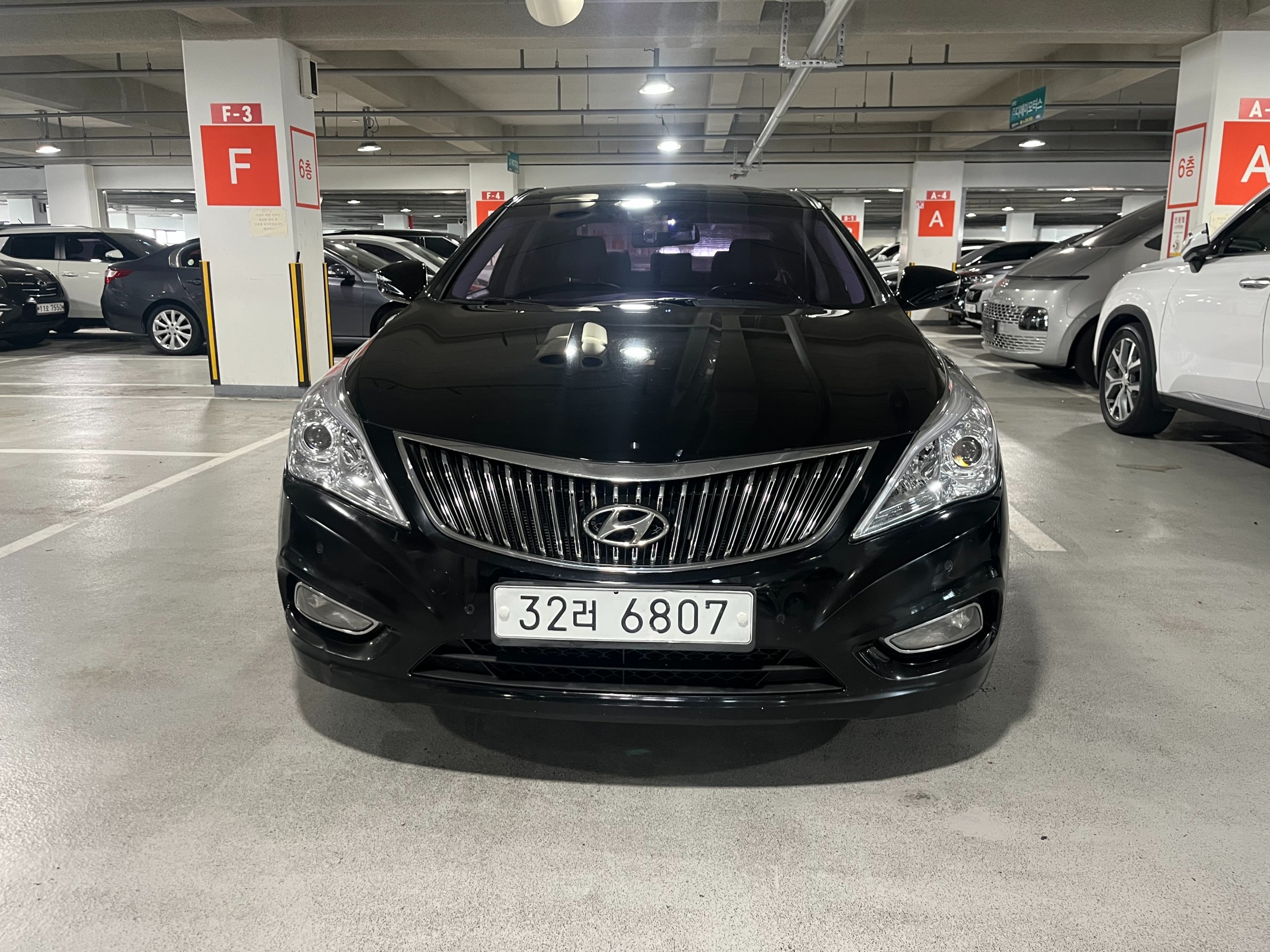 Used Korean vehicle on a dealer lot in South Korea