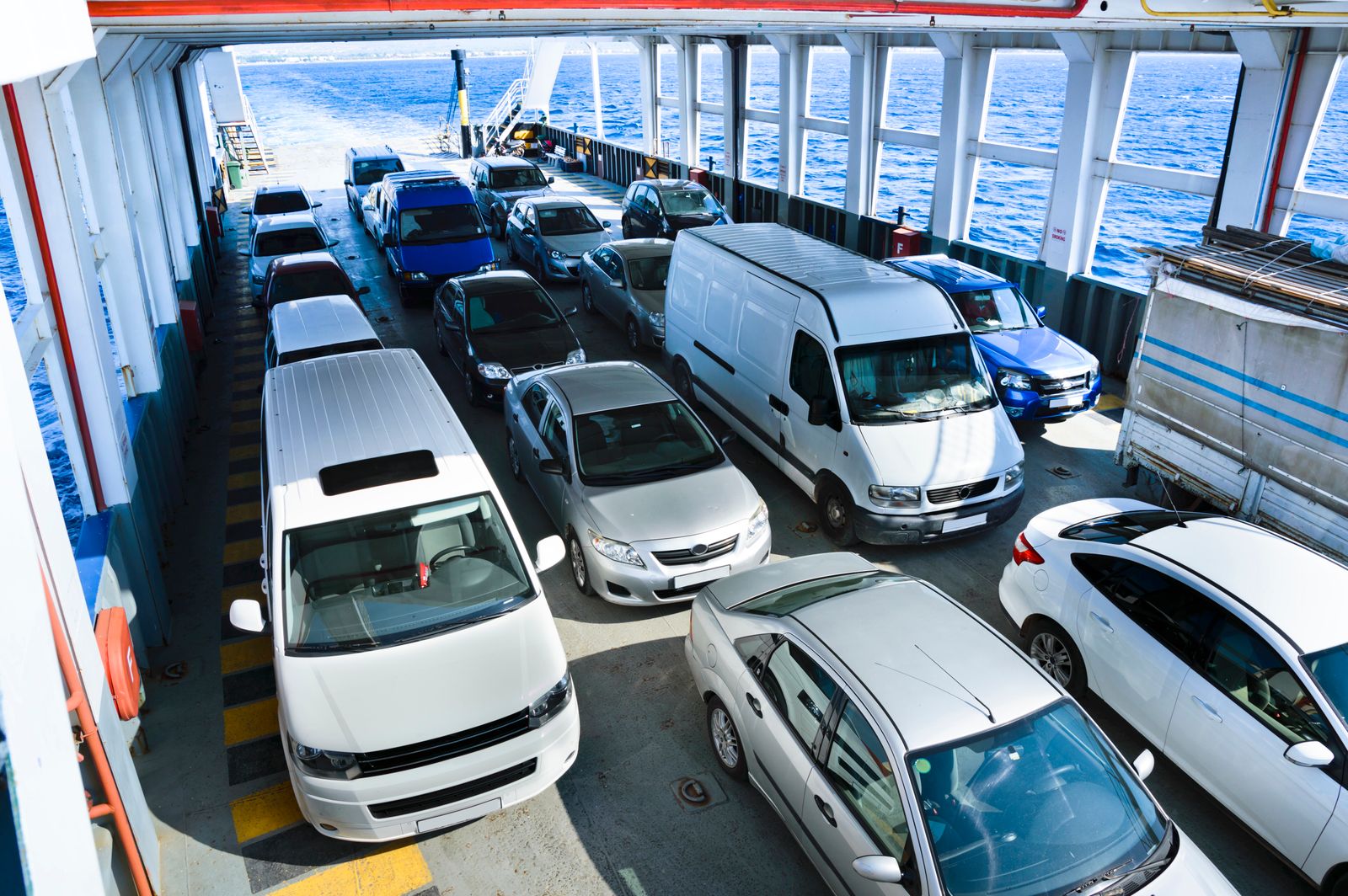 Cars parked on the vehicle deck of a roll-on roll-off ship