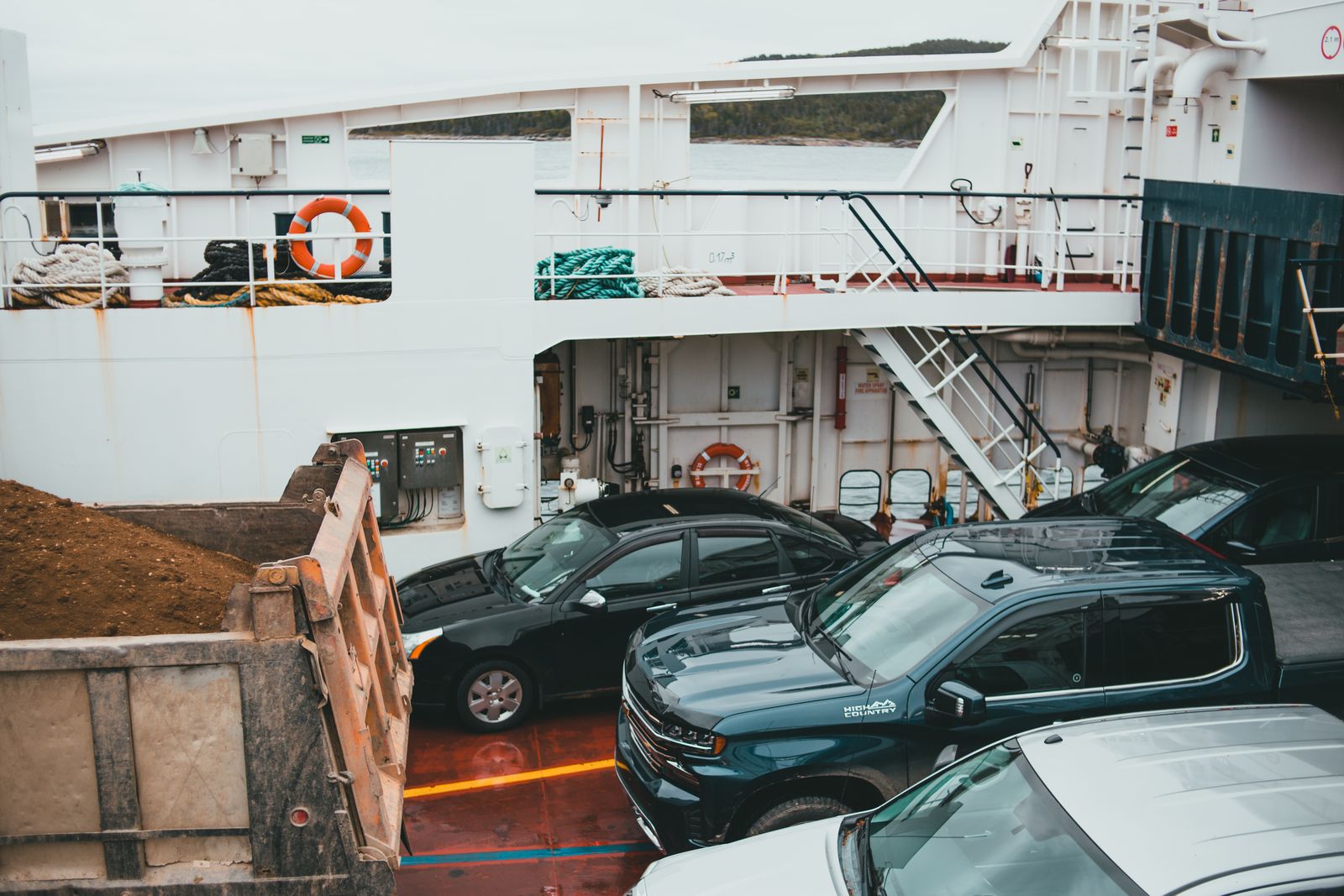 Cars parked on the vehicle deck of a roll-on roll-off ship